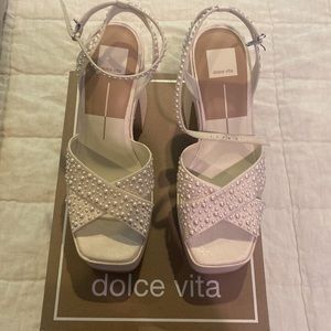 Brand new in box, never worn.  Wessi Pearl platform shoes by Dolce Vita.